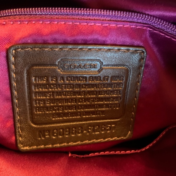 Coach Brown signature handbag, zips, GOLD hardware, Purple lining and footed. - Picture 11 of 11